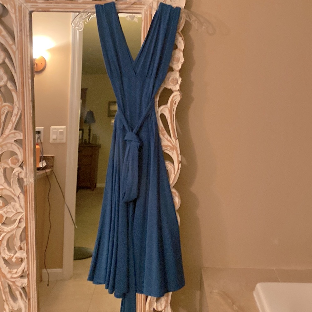 Strappy, sexy wrap dress. A pretty teal color.